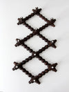antique Victorian accordion wall rack