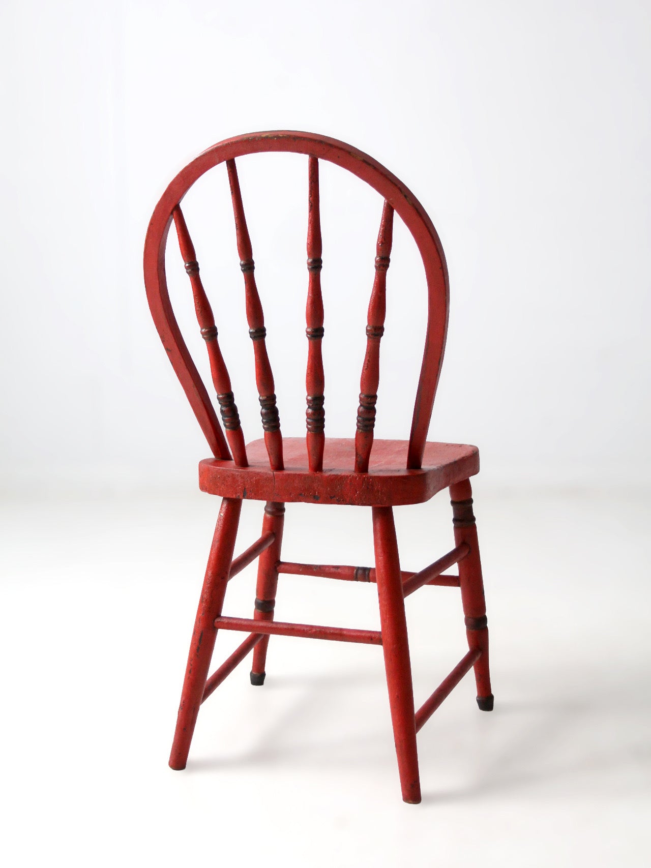 antique red painted bow back Windsor chair
