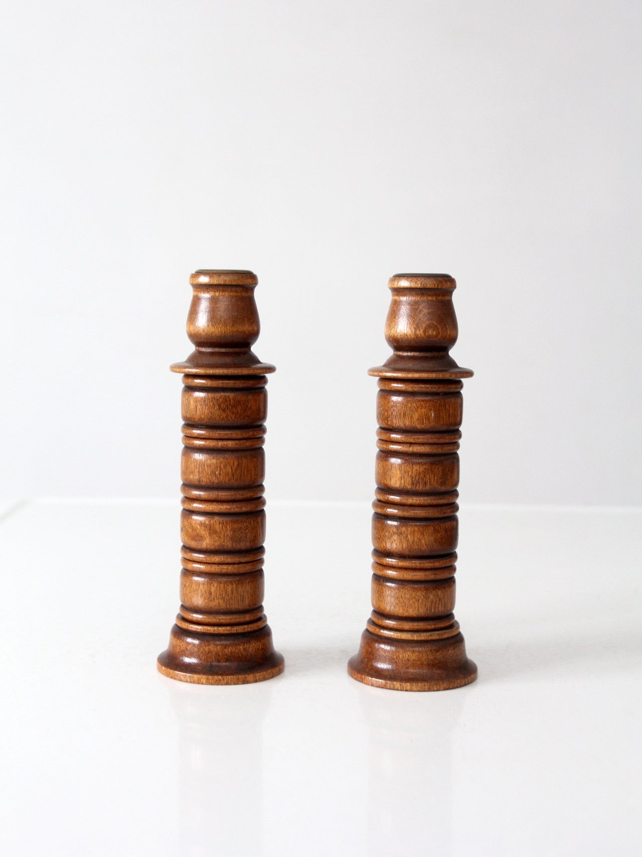 pair of vintage modular wood candlestick holders