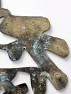 vintage brass good luck symbol trivet
