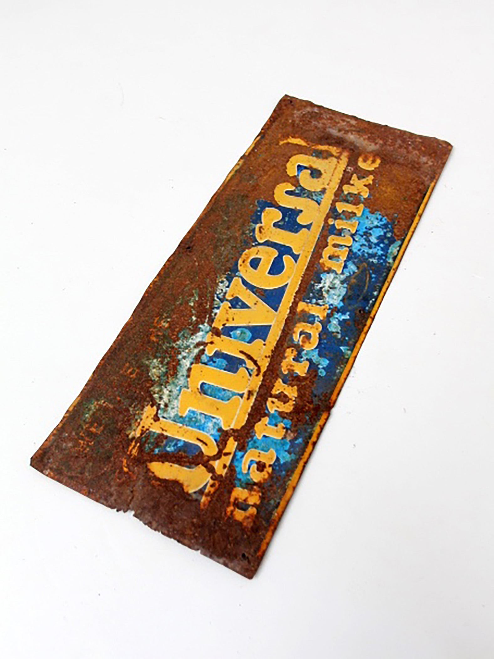 vintage Universal Natural Milker metal sign