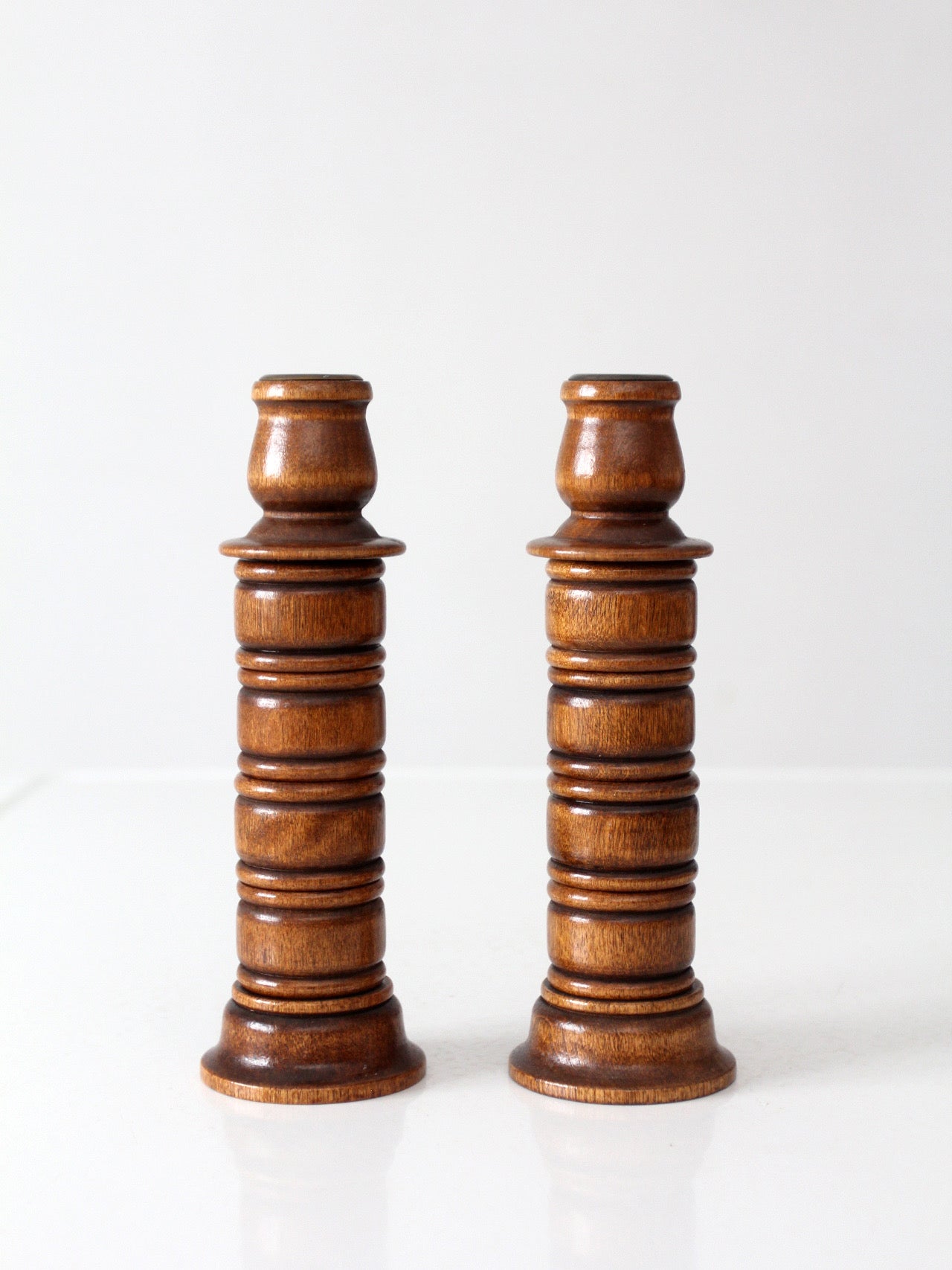 pair of vintage modular wood candlestick holders