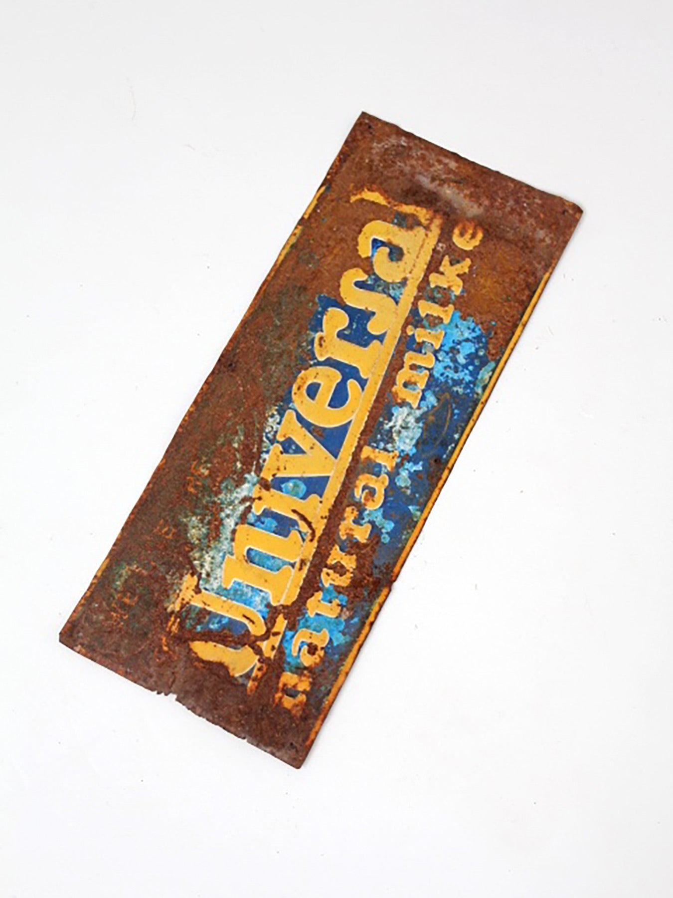 vintage Universal Natural Milker metal sign
