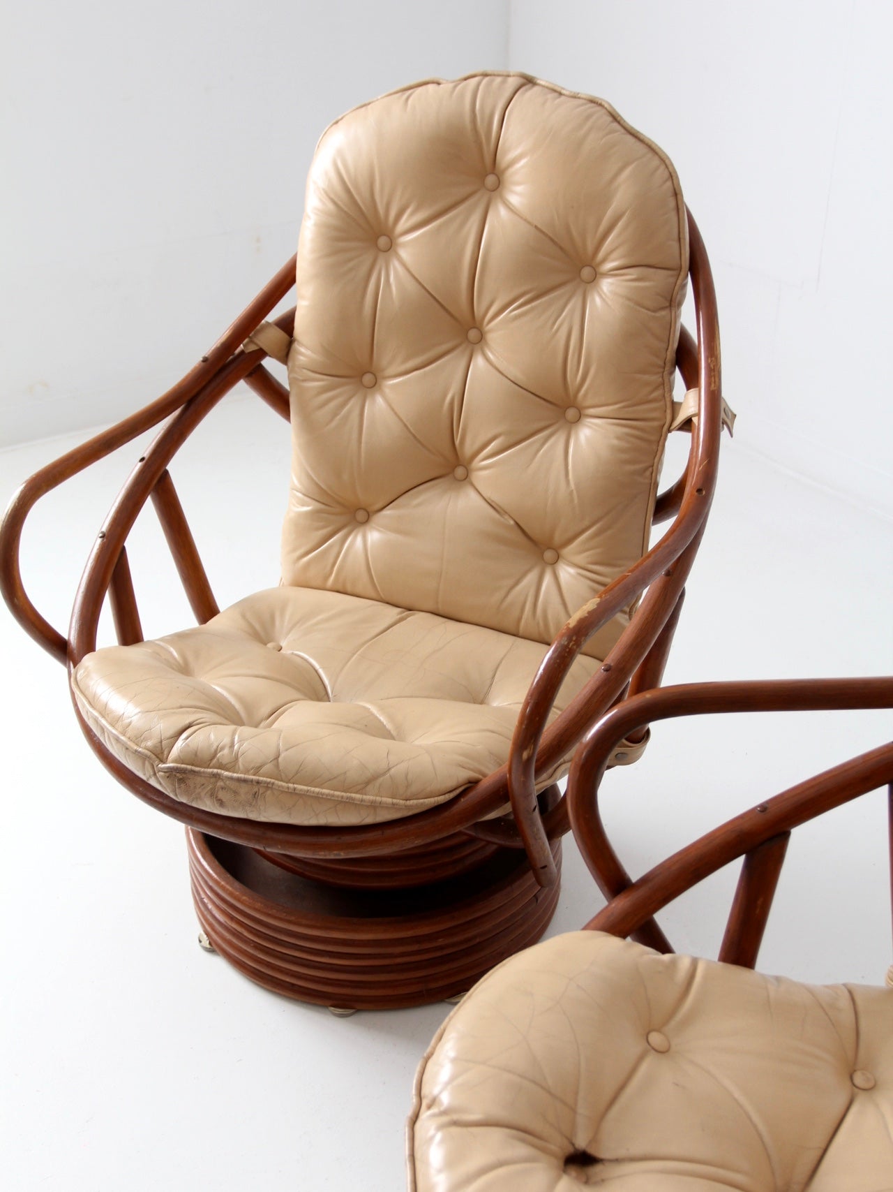 vintage 1970s rattan swivel lounge chairs with ottomans