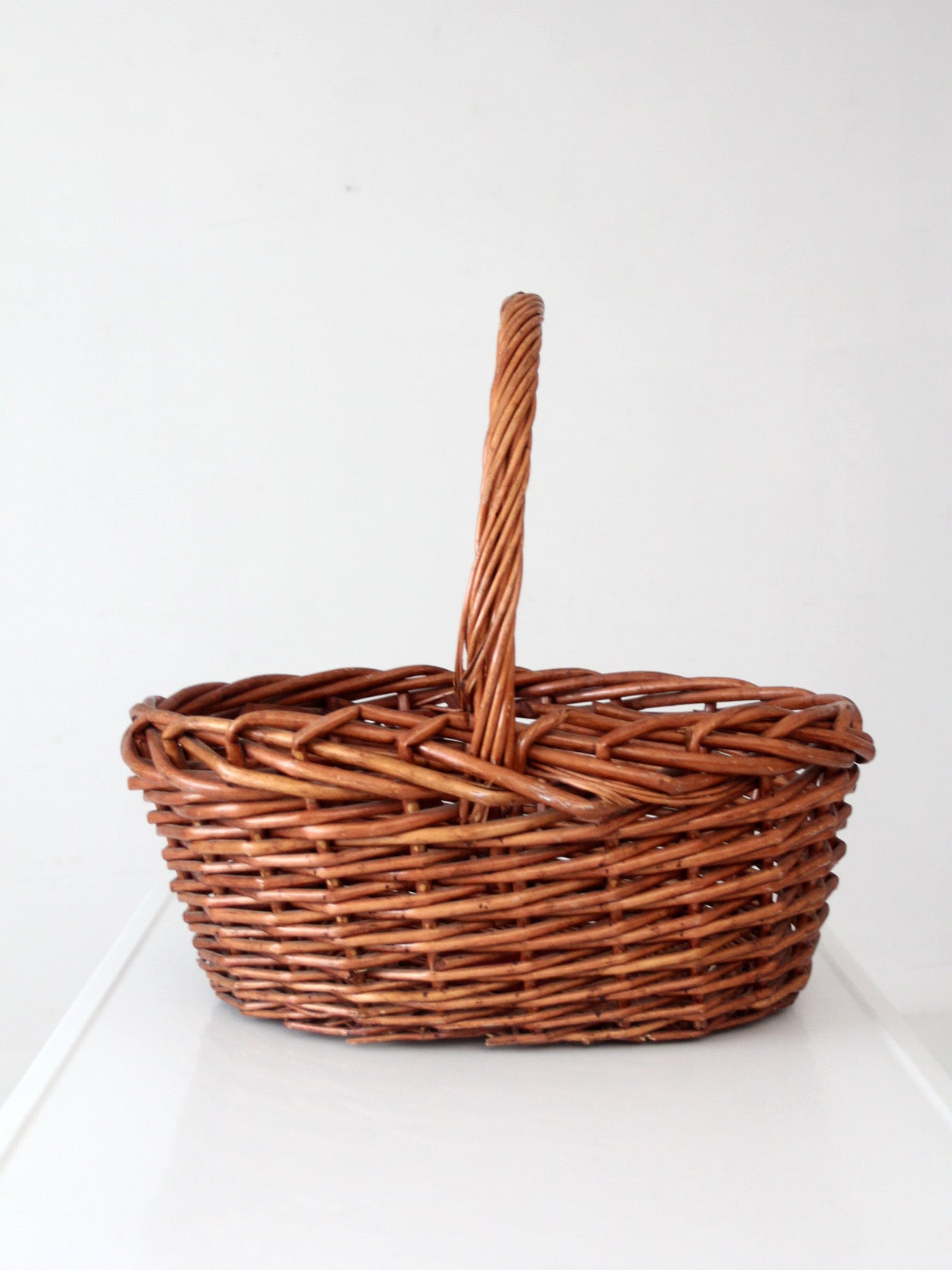 vintage large willow gathering basket with tall handle