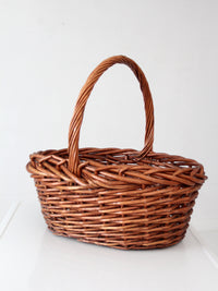 vintage large willow gathering basket with tall handle