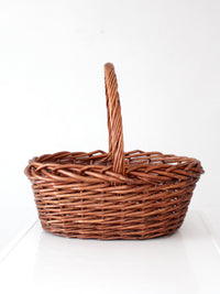 vintage large willow gathering basket with tall handle
