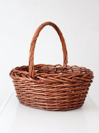 vintage large willow gathering basket with tall handle