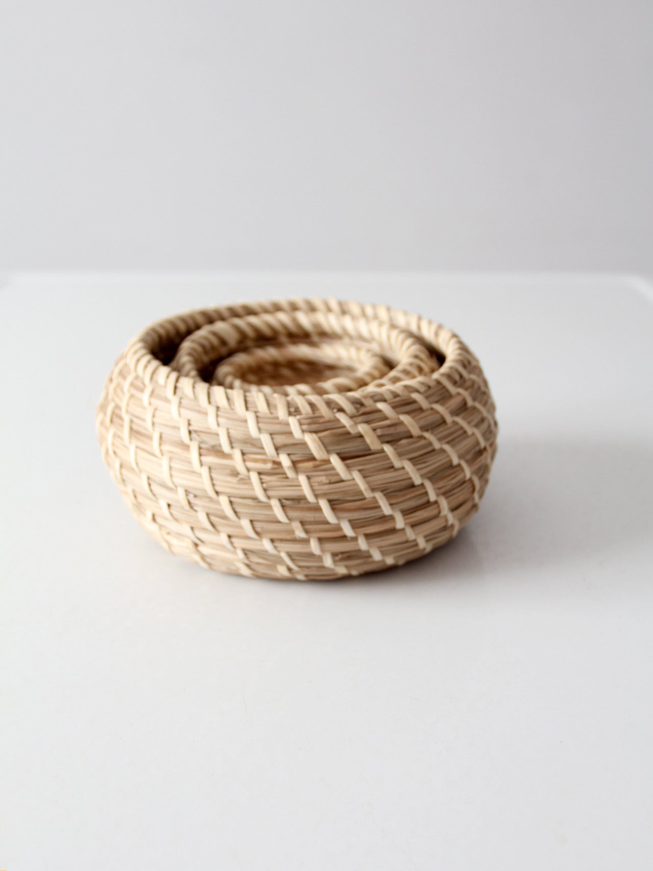 vintage set of 3 woven nesting baskets