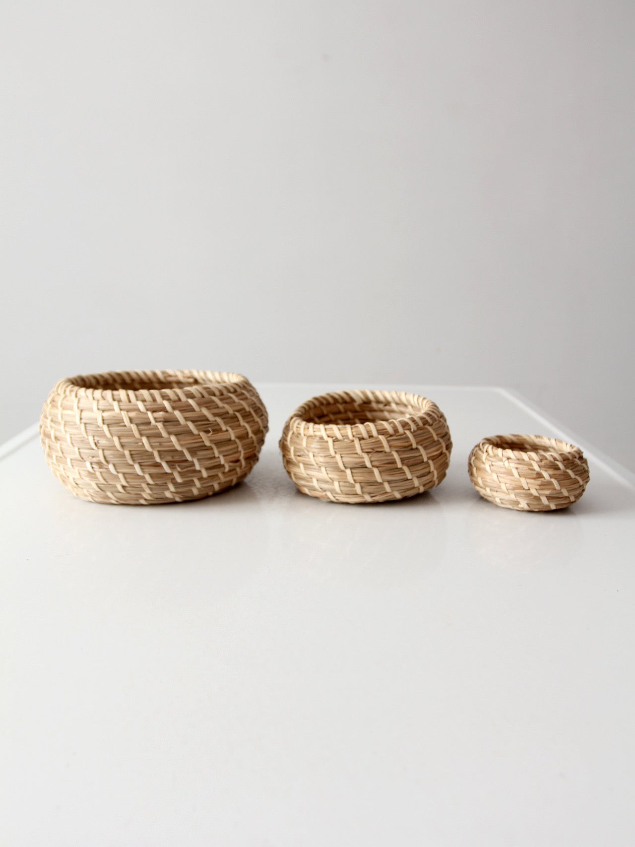 vintage set of 3 woven nesting baskets