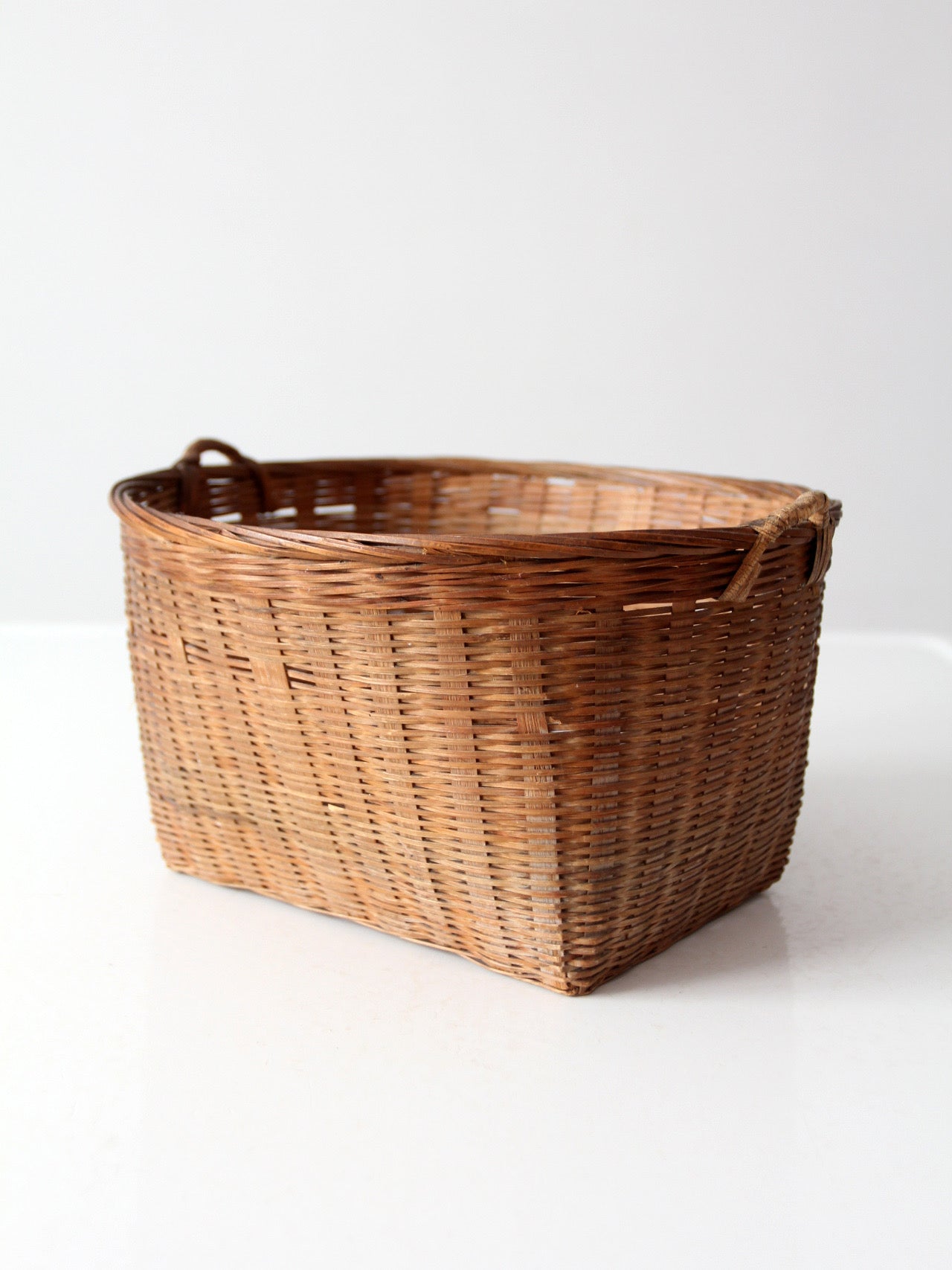 vintage woven rattan basket with handles