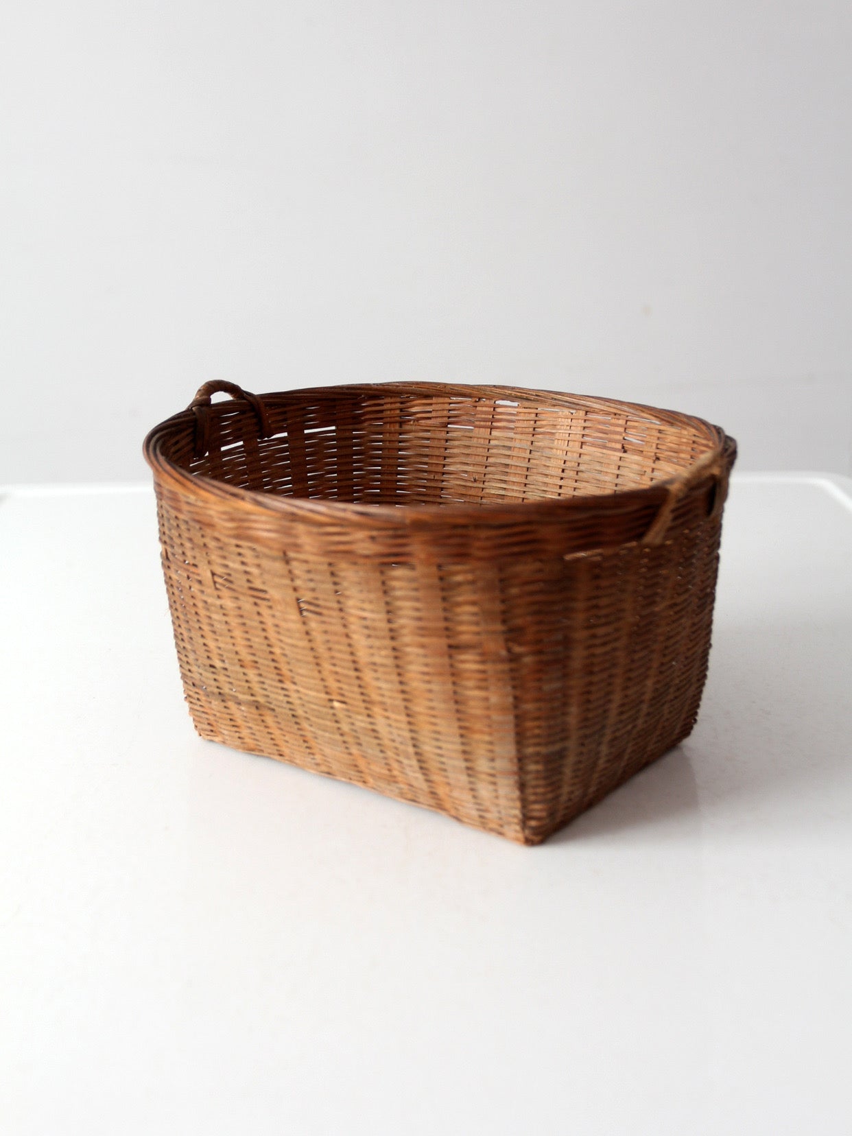 vintage woven rattan basket with handles