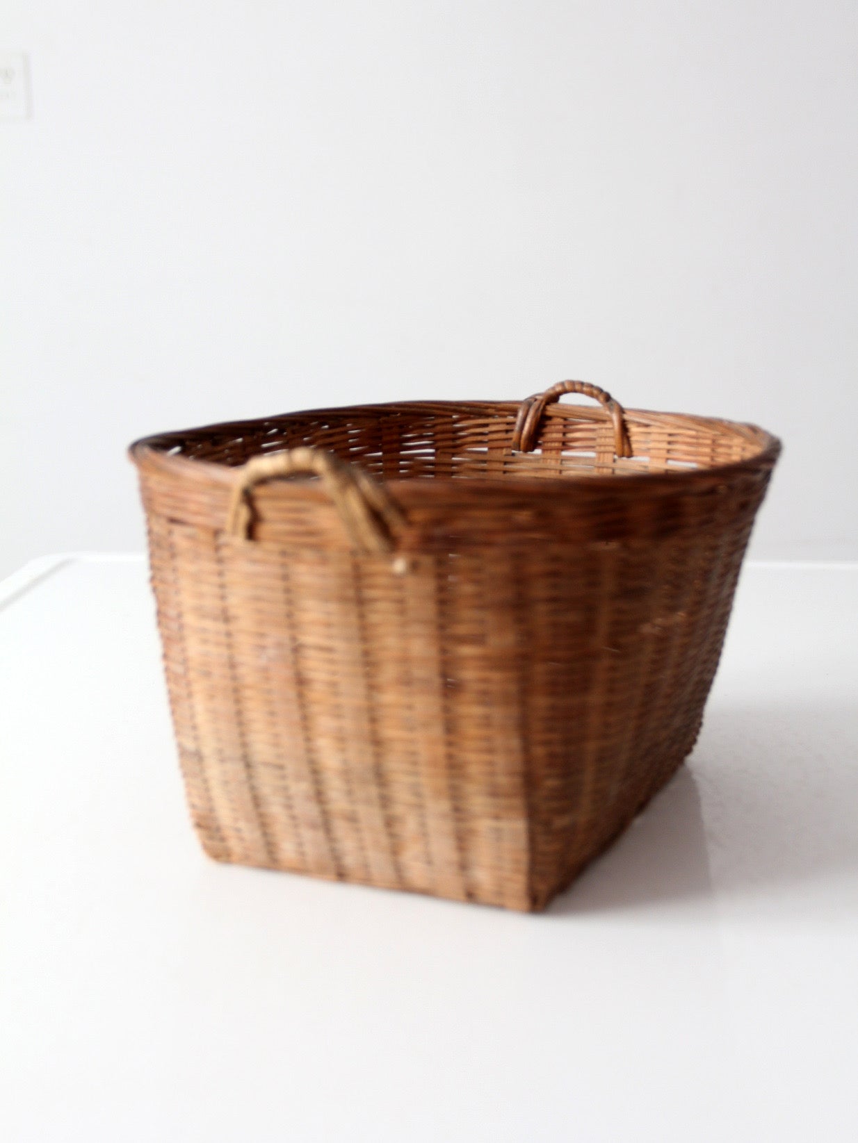 vintage woven rattan basket with handles