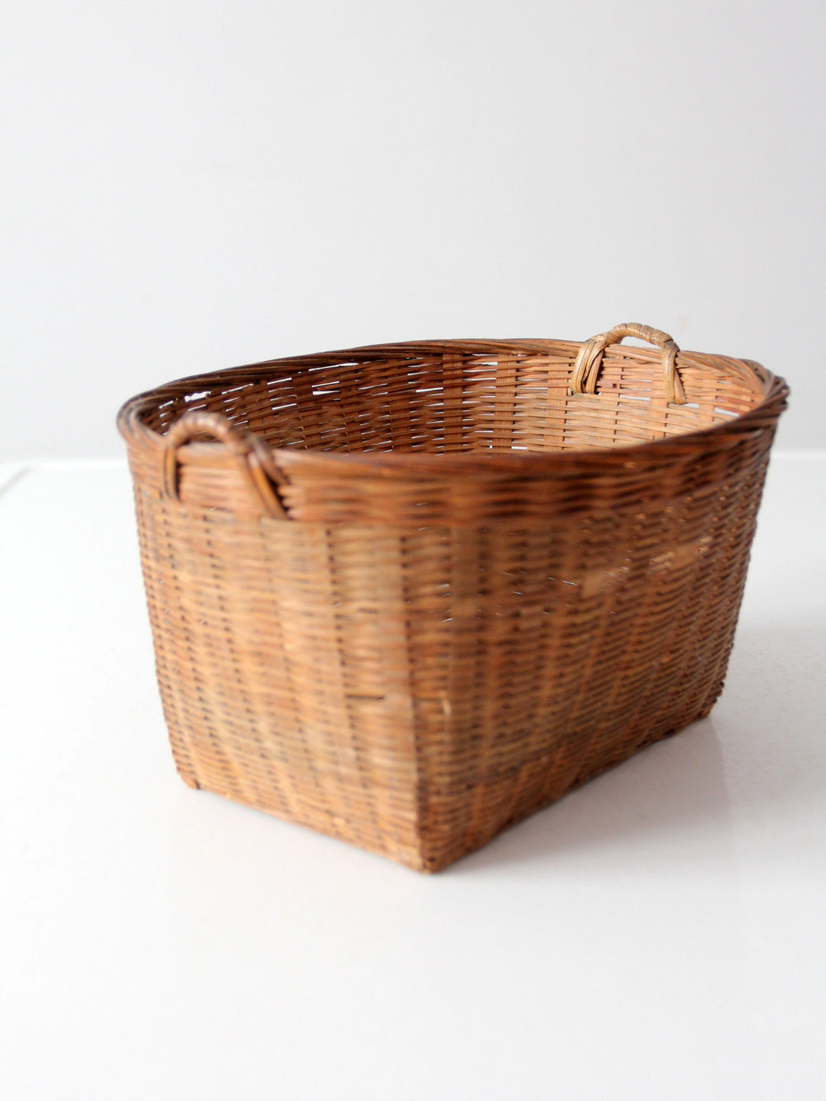 vintage woven rattan basket with handles