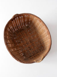 vintage woven rattan basket with handles