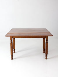 antique American country drop leaf table