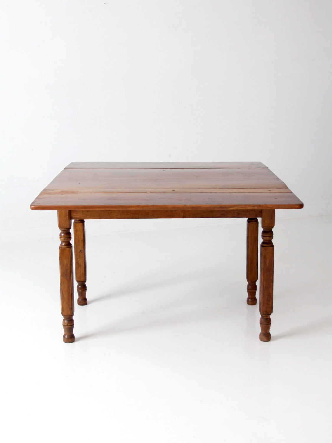 antique American country drop leaf table