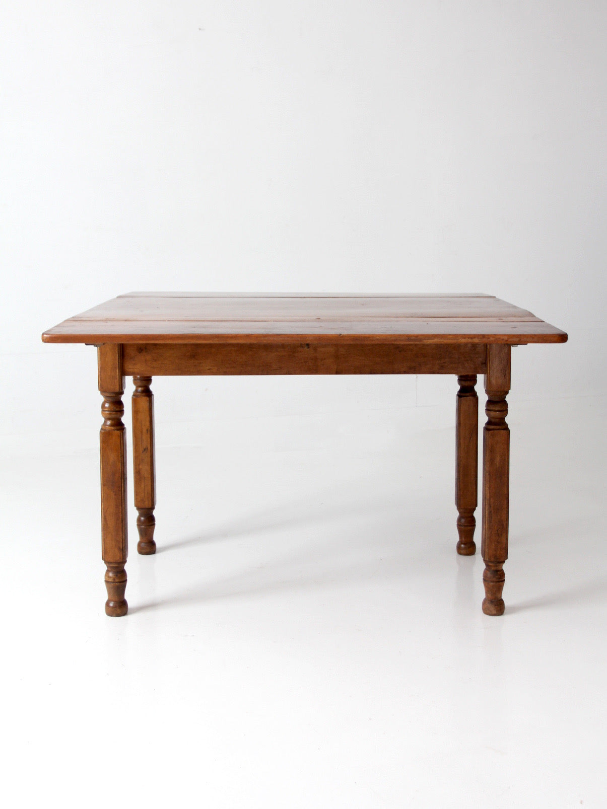 antique American country drop leaf table