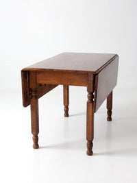 antique American country drop leaf table