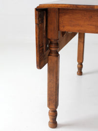 antique American country drop leaf table