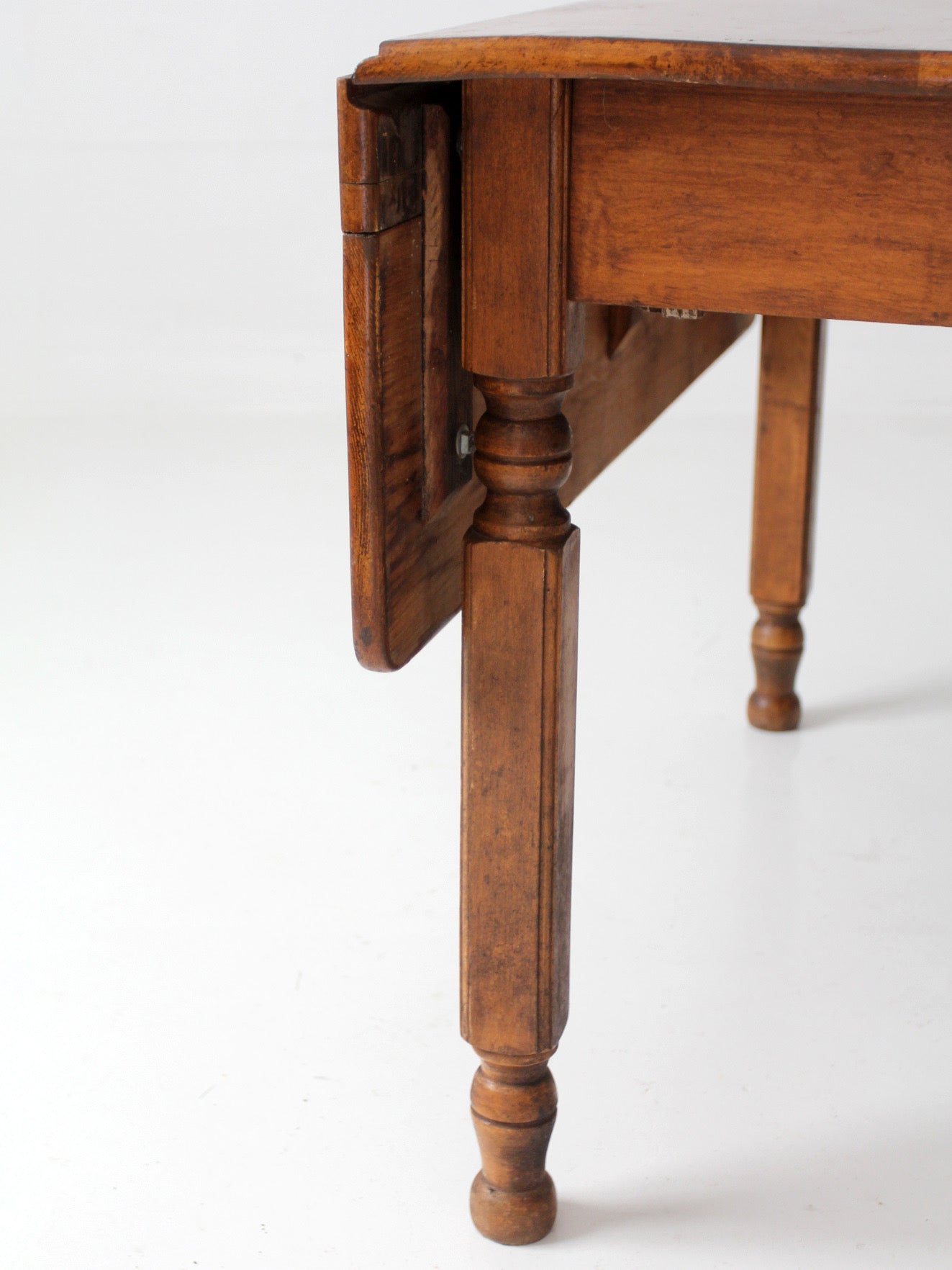antique American country drop leaf table