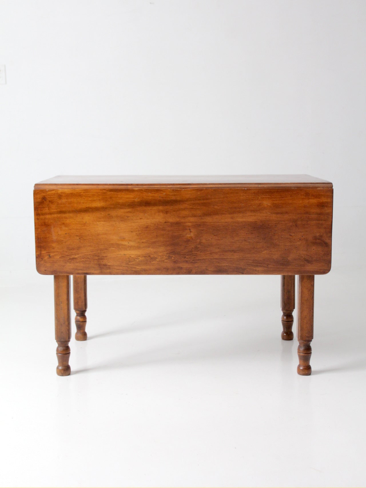 antique American country drop leaf table