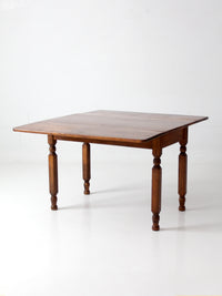 antique American country drop leaf table