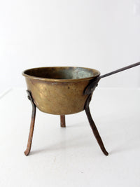 antique brass and iron three-legged hearth cooking pan
