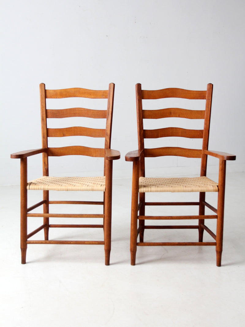pair antique ladder back arm chairs