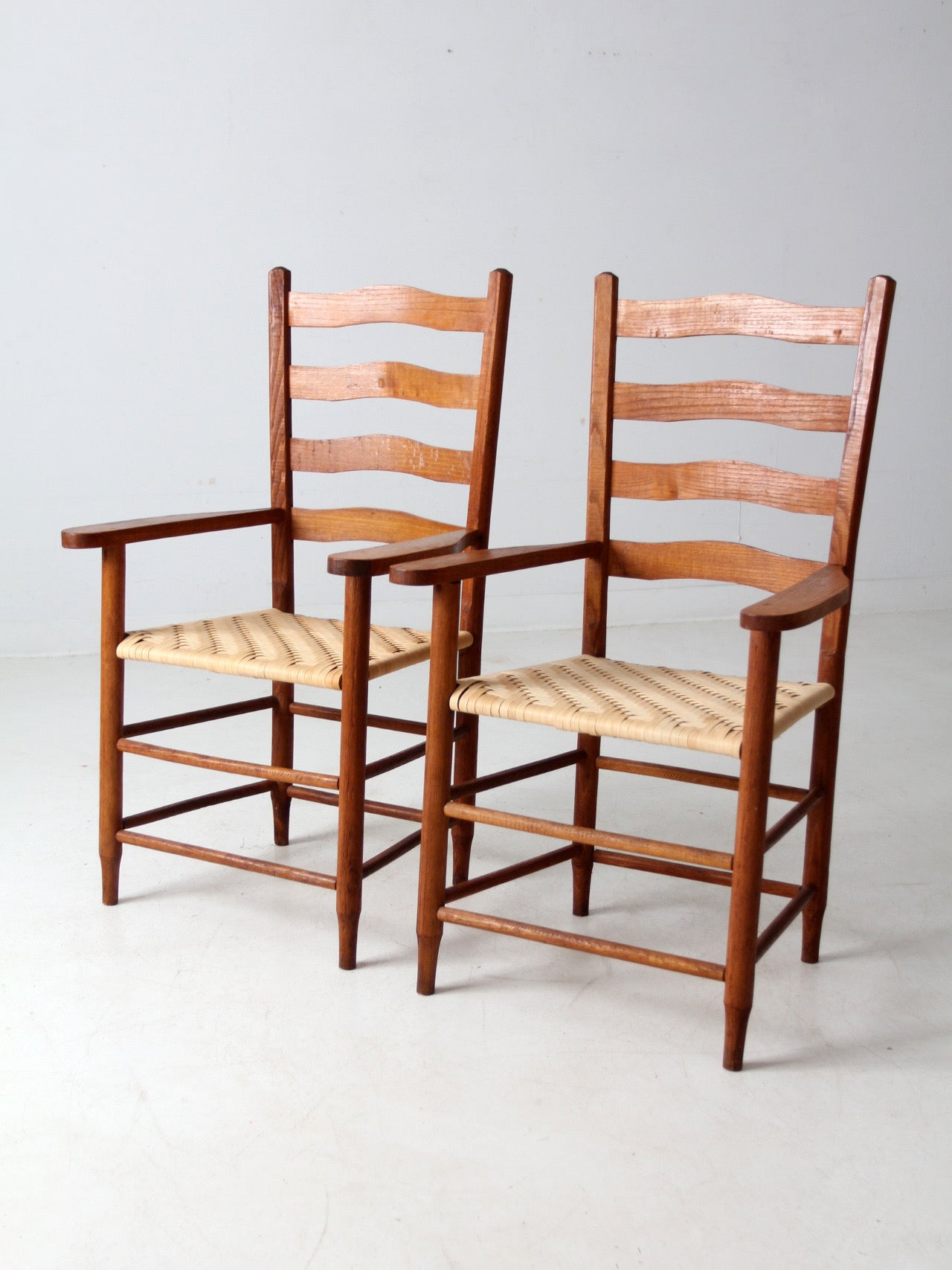 pair antique ladder back arm chairs