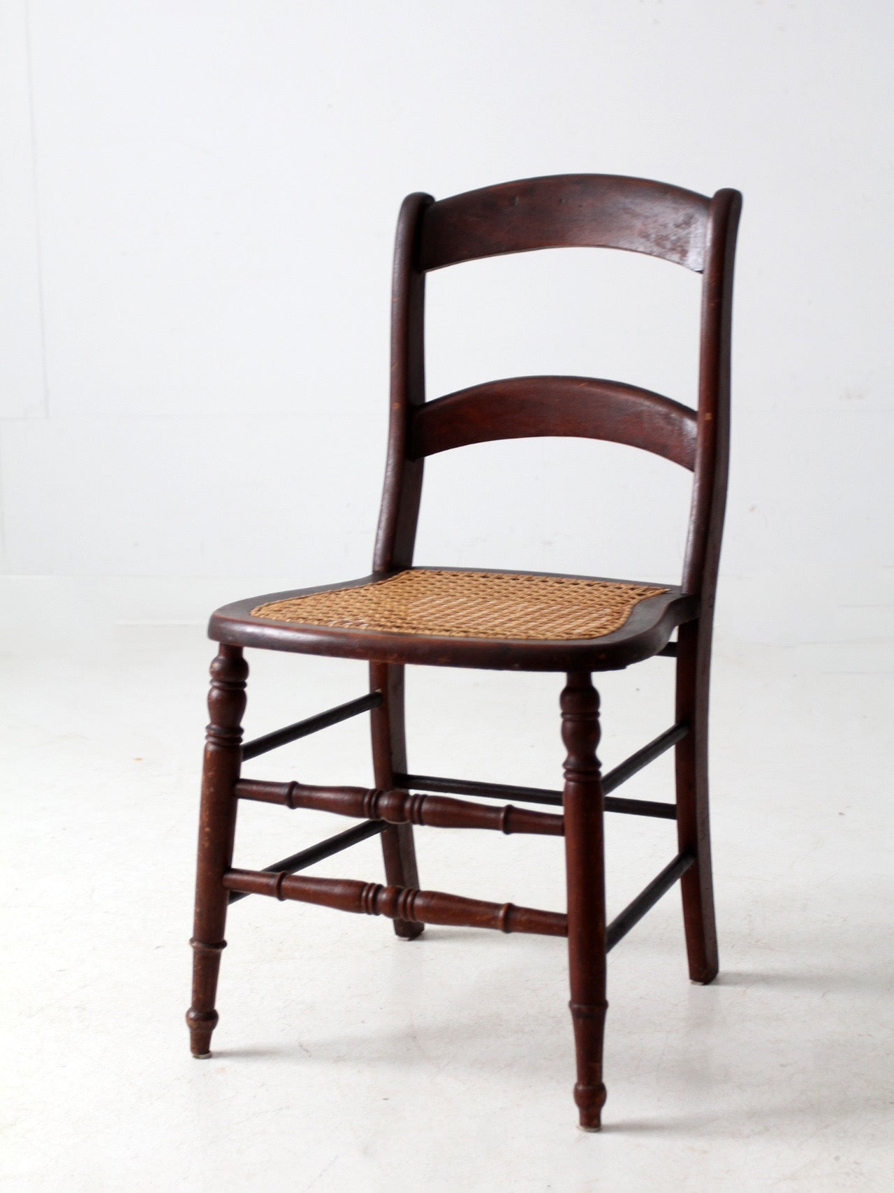 antique American cane seat ladder back chair