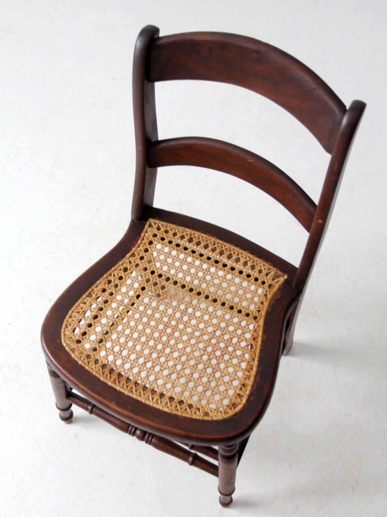 antique American cane seat ladder back chair