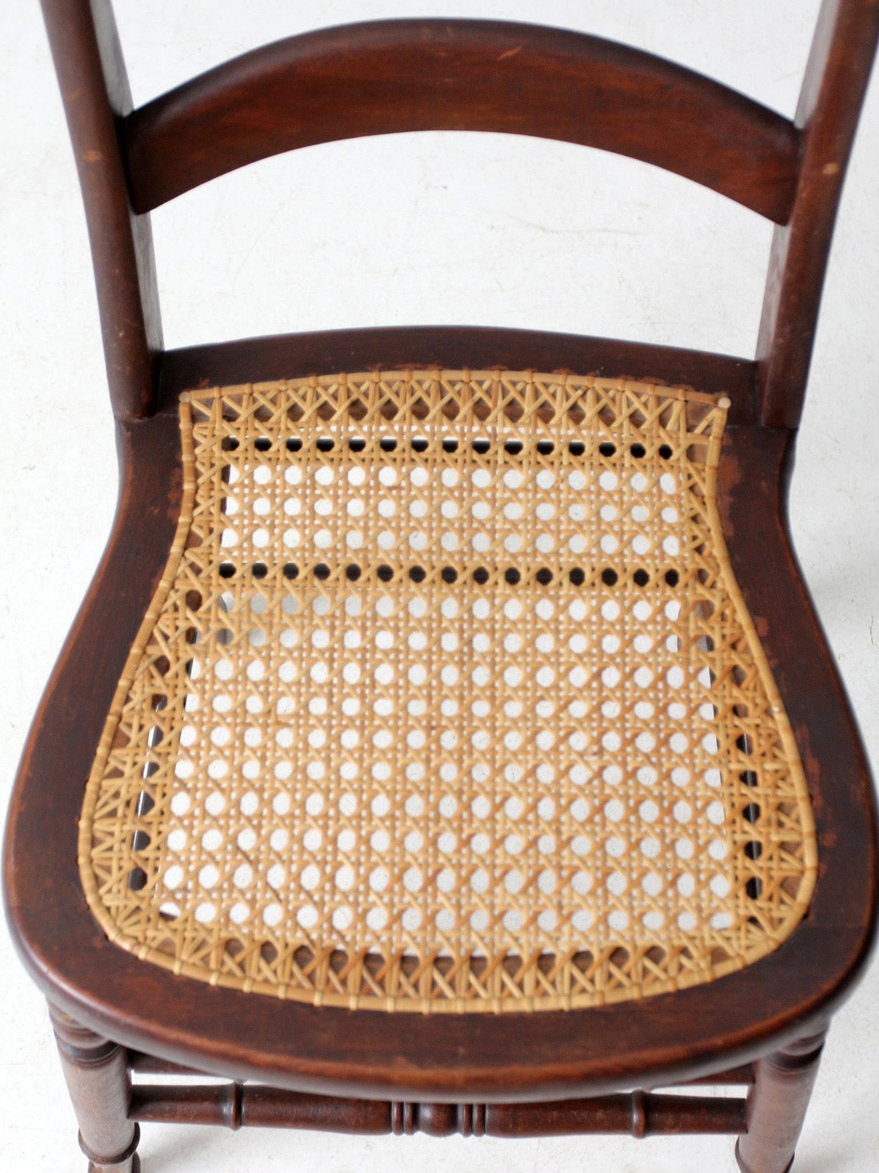 antique American cane seat ladder back chair