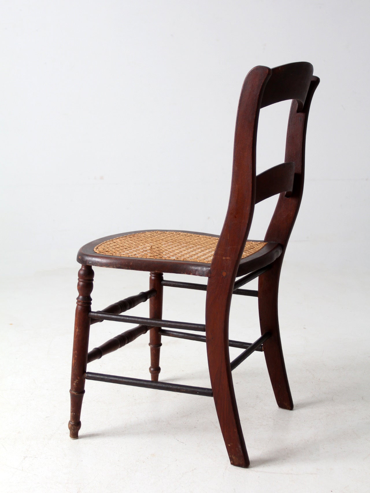 antique American cane seat ladder back chair