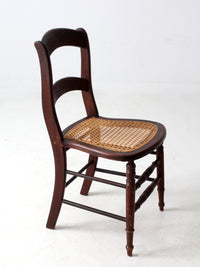 antique American cane seat ladder back chair