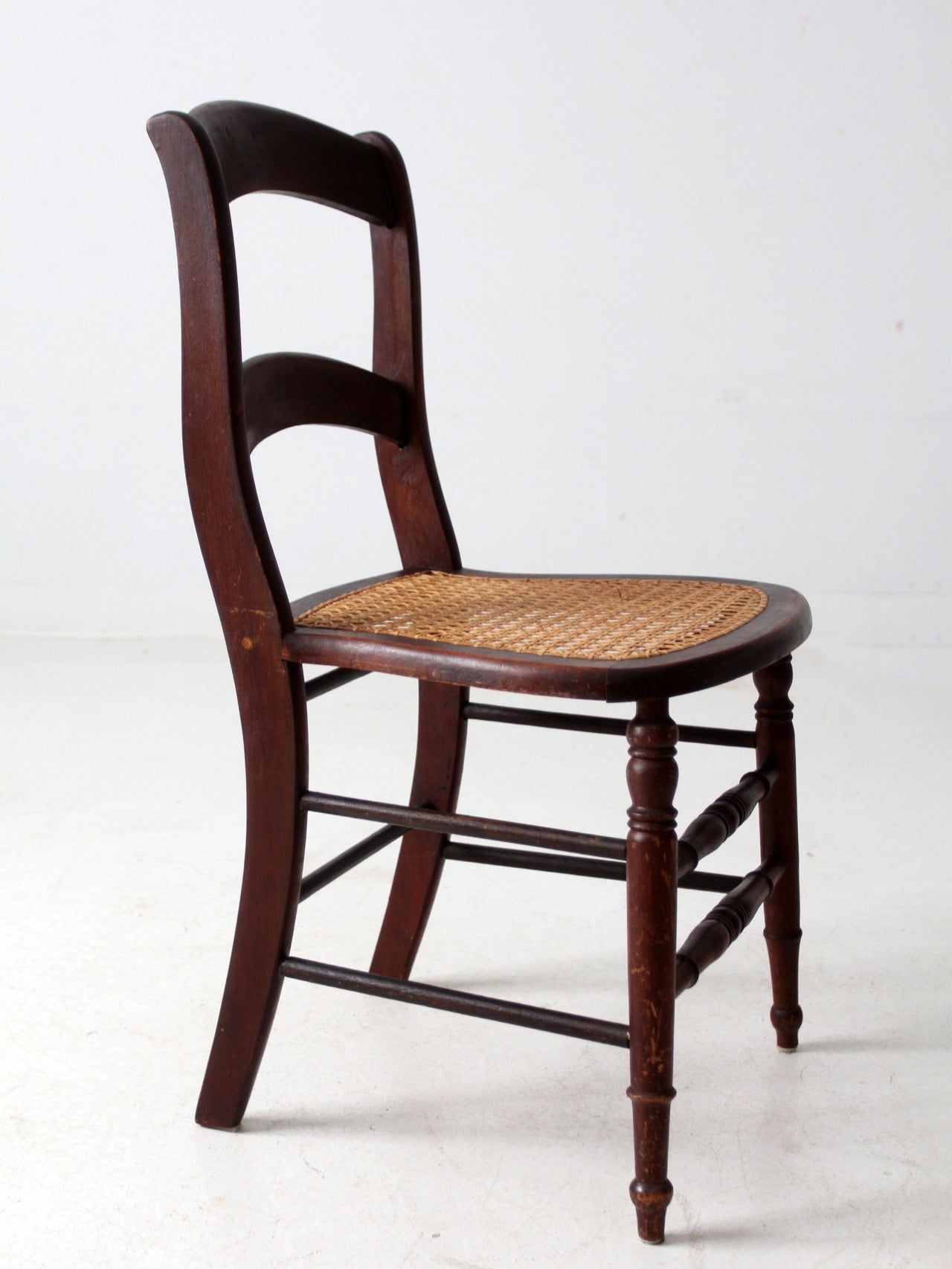 antique American cane seat ladder back chair