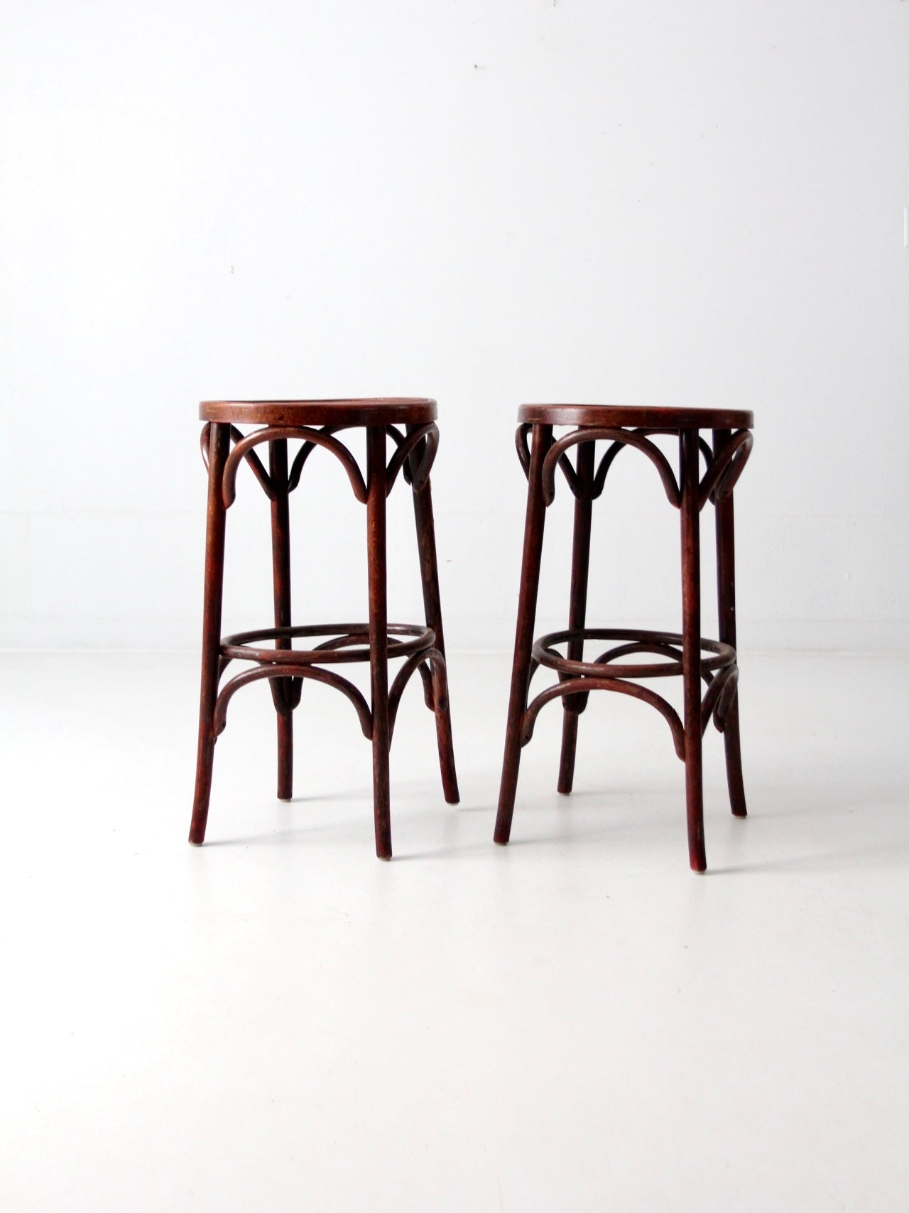 early 20th century bentwood stools pair