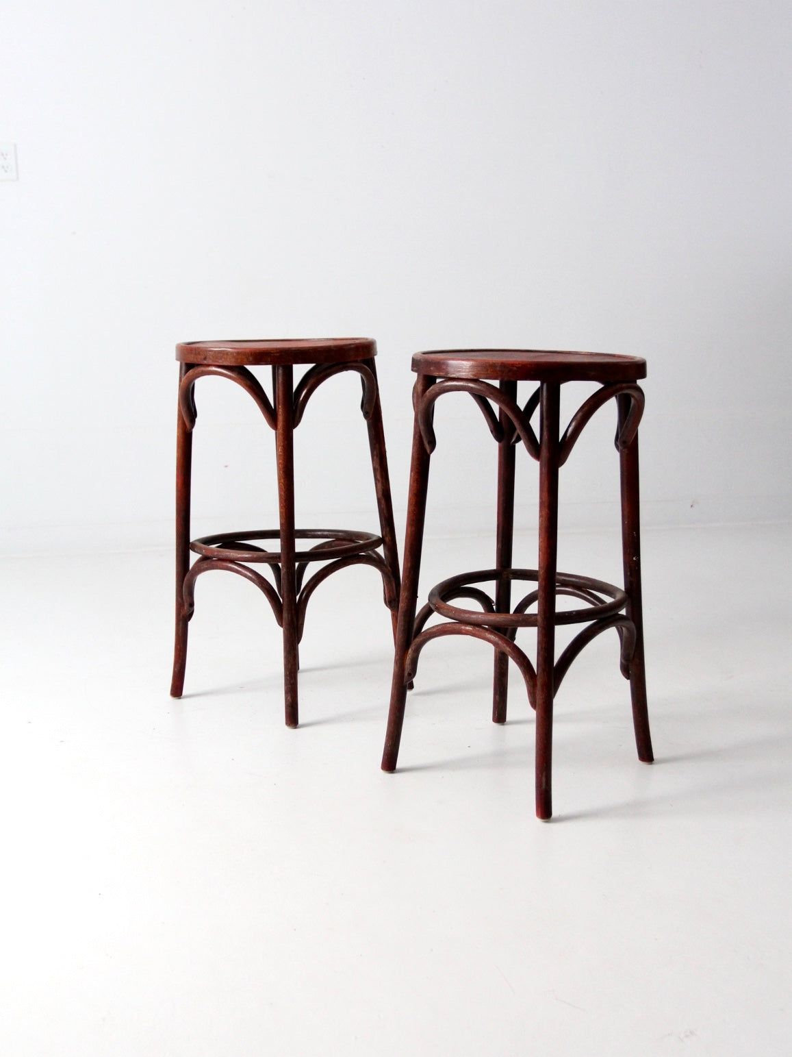 early 20th century bentwood stools pair