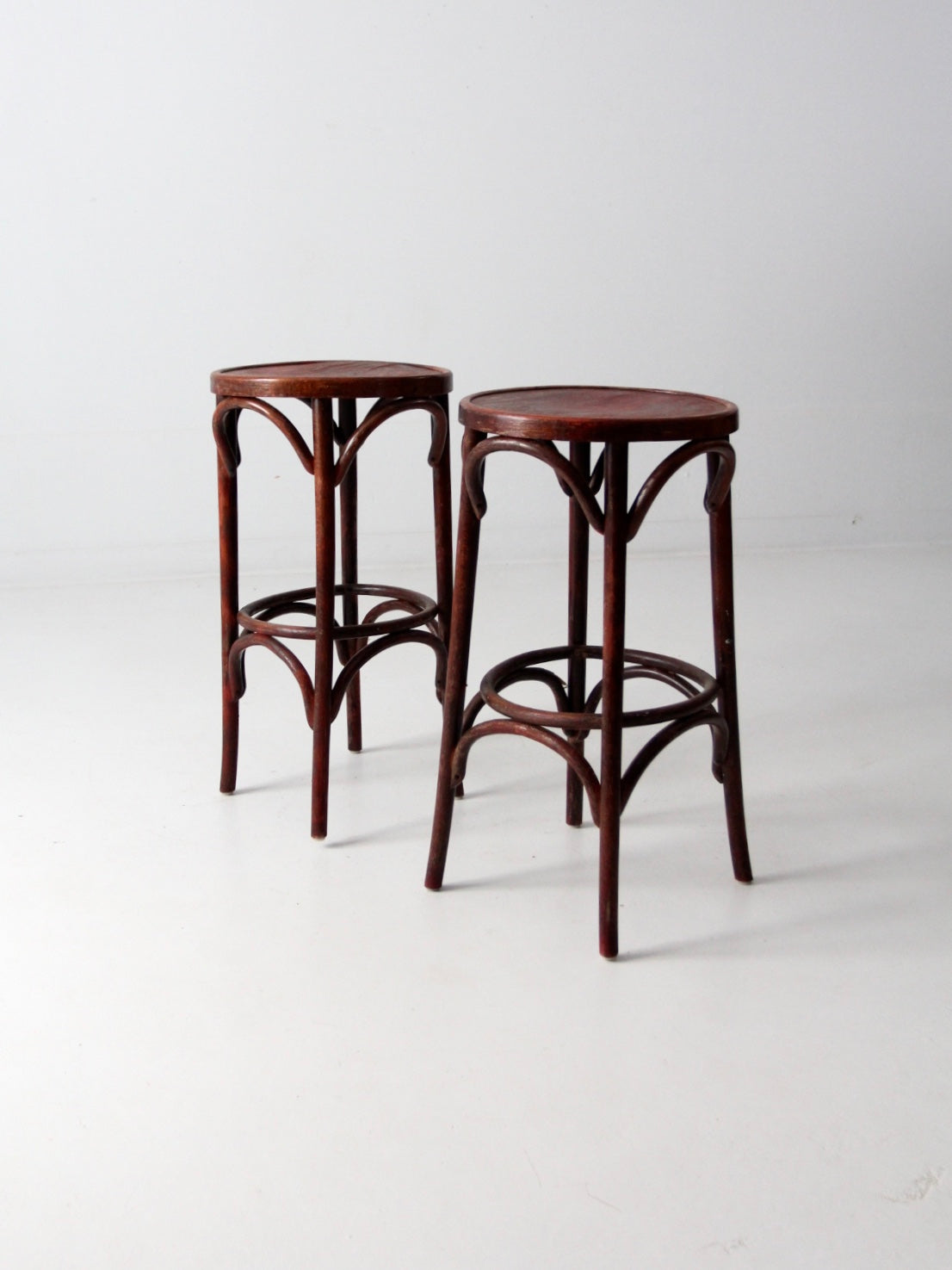early 20th century bentwood stools pair
