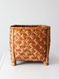 vintage geometric woven bamboo storage basket, circa 1970s