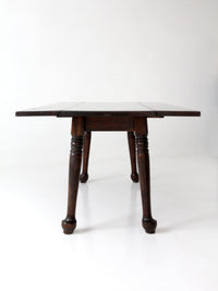 early American style drop leaf dining table
