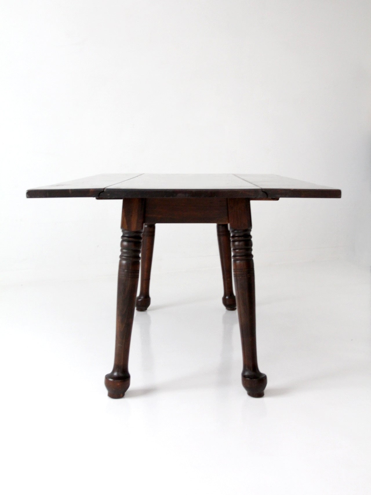 early American style drop leaf dining table