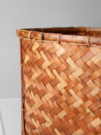 vintage geometric woven bamboo storage basket, circa 1970s