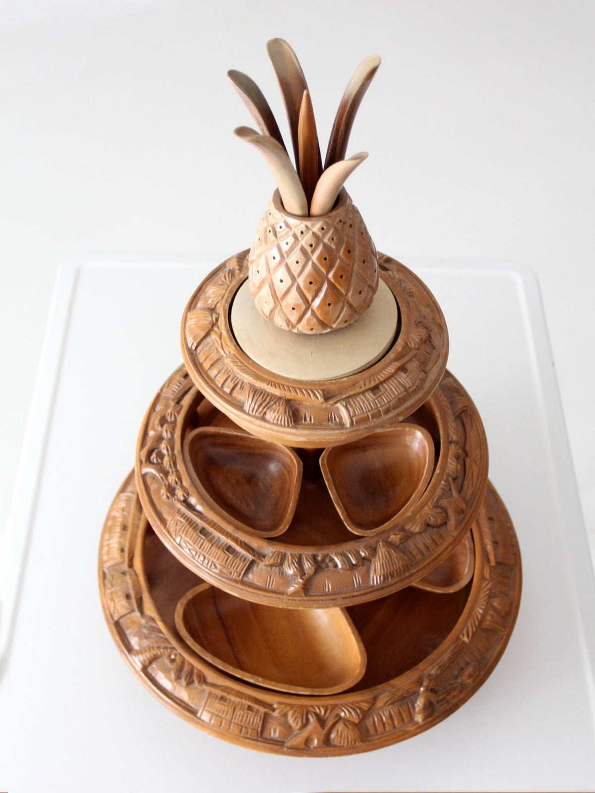 mid-century carved wood tiered lazy Susan with pineapple finial