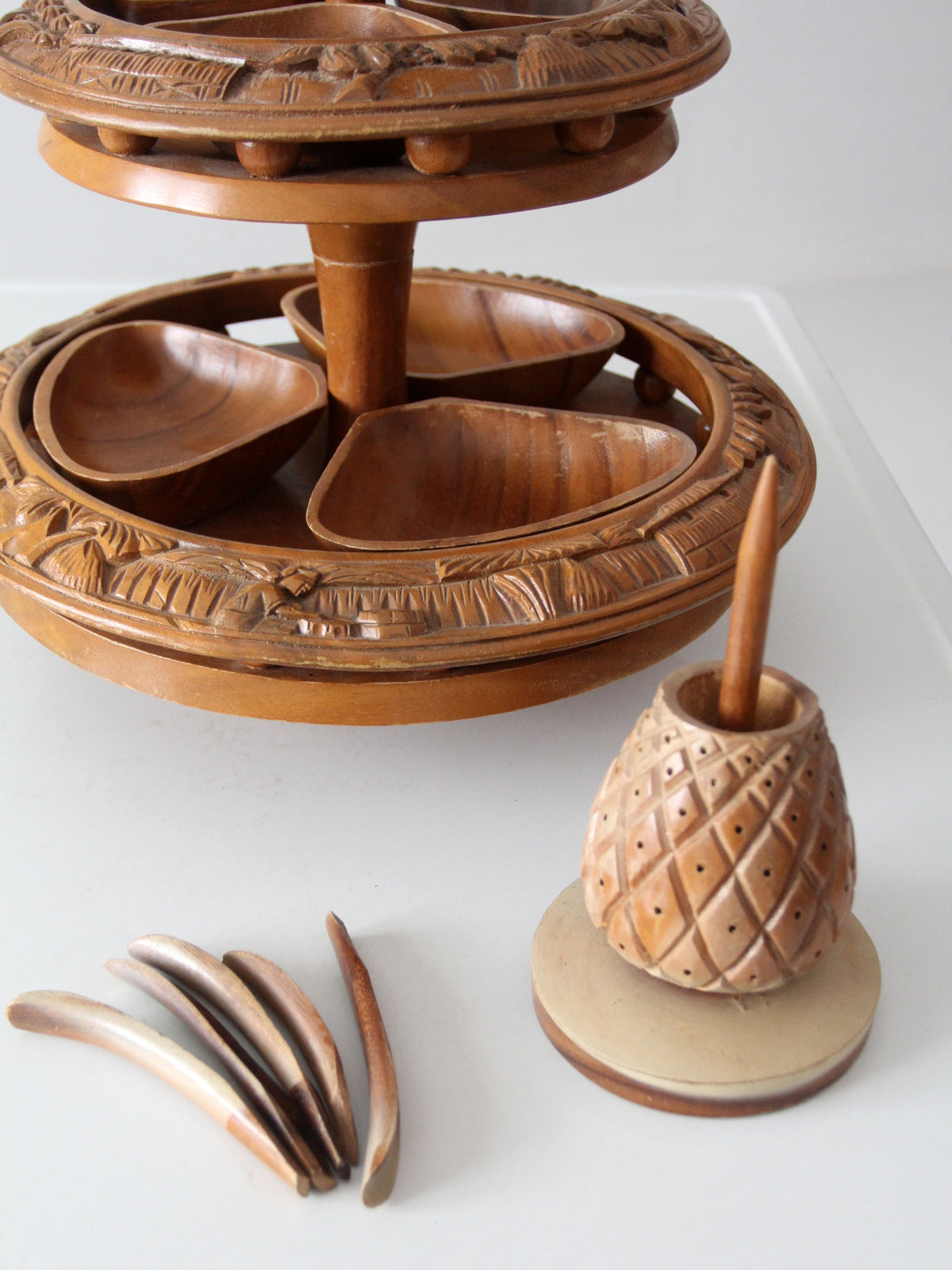 mid-century carved wood tiered lazy Susan with pineapple finial