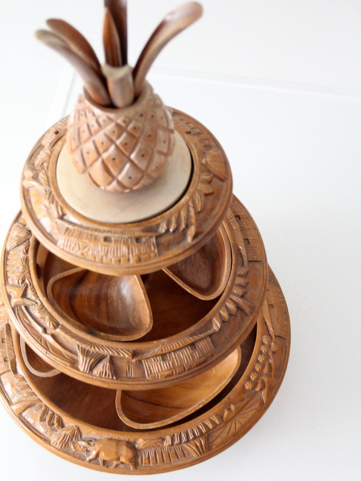 mid-century carved wood tiered lazy Susan with pineapple finial