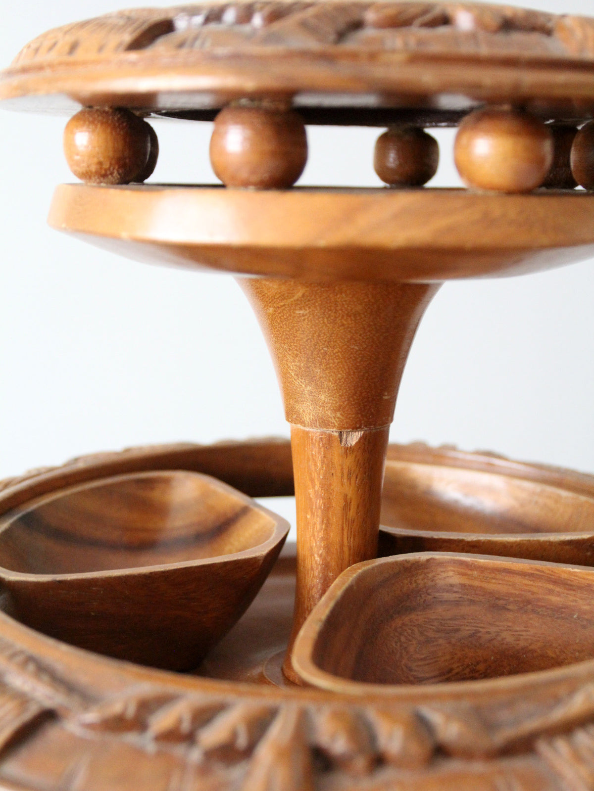 mid-century carved wood tiered lazy Susan with pineapple finial