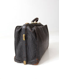 antique 1920s black leather suitcase with brass hardware