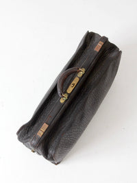 antique 1920s black leather suitcase with brass hardware