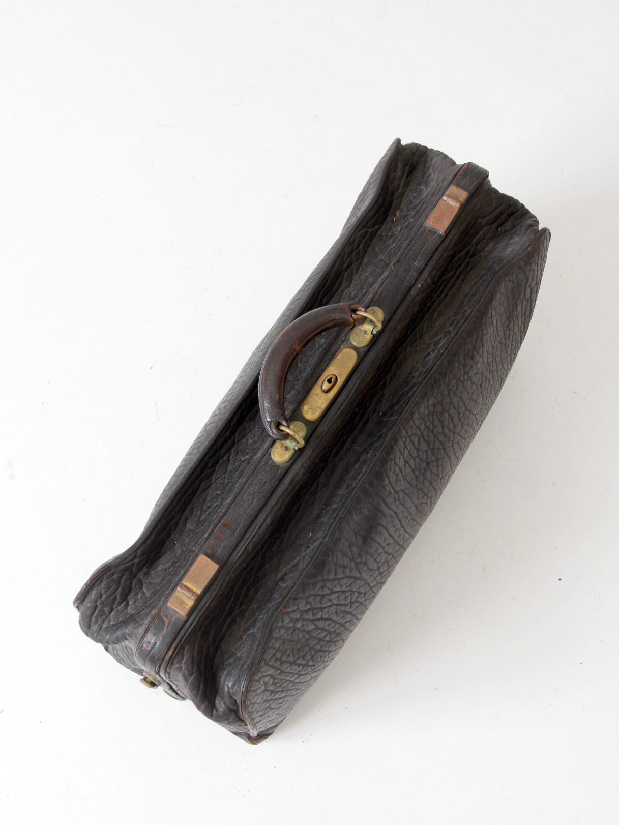 antique 1920s black leather suitcase with brass hardware